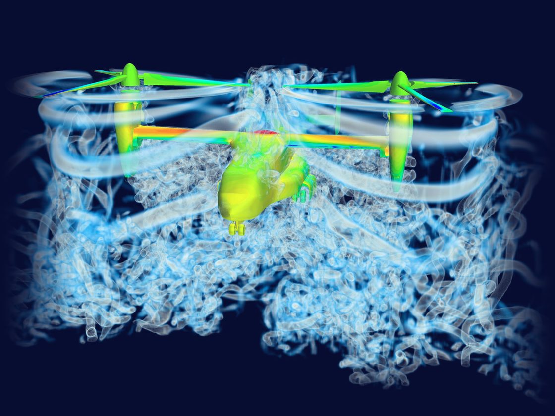 Simcenter STAR-CCM+ simulation of a tiltrotor aircraft, with the rotor-wake vortices shown as translucent tubes